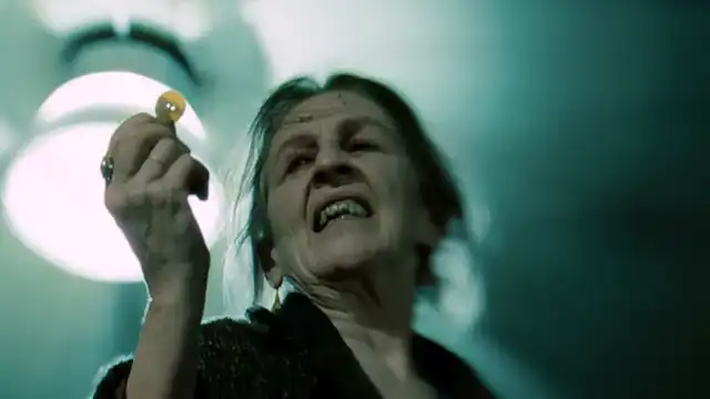 Drag Me to Hell button curse