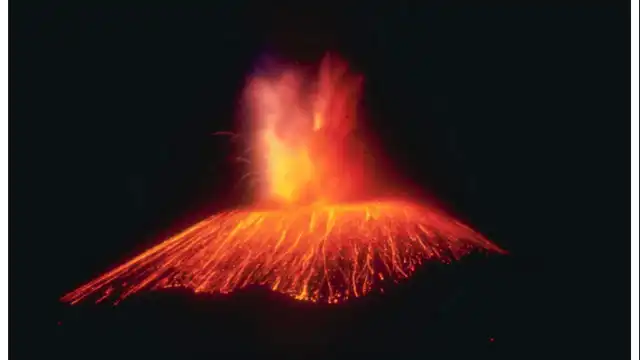 Parícutin: The Volcano Born in a Mexican Cornfield Parícutin launching molten rock at night
