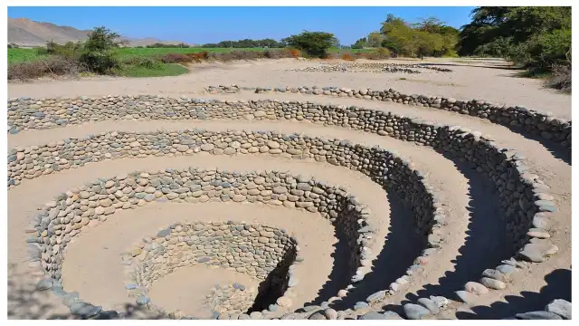 Spiraling 'ojo' access well