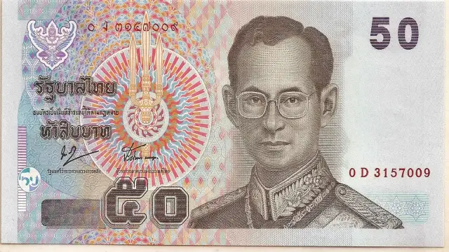 10 Weird Laws Around the World Every Traveler Should Know Thai currency, the Baht